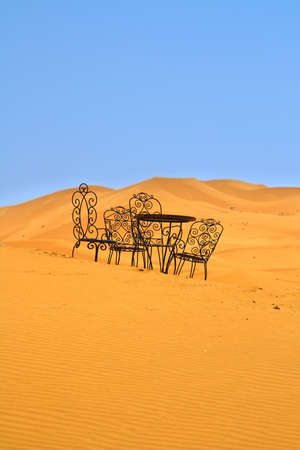 romantic place to sit on the Sahara desertの写真素材