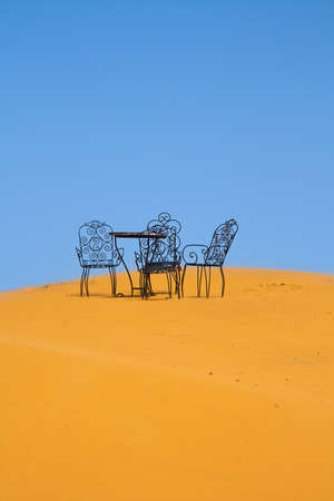 romantic place to sit on the Sahara desertの写真素材