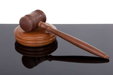 wooden gavel with reflection on black and whiteの写真素材