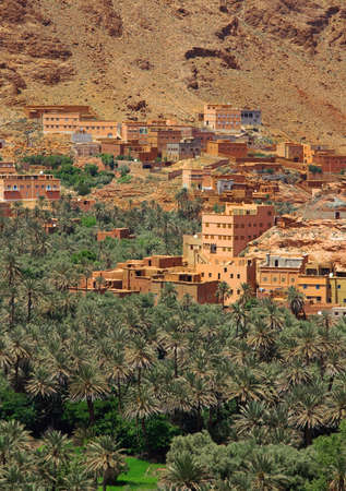 panorama of a village among Moroccan hills, view from the road from Tinerhir to Todra goreの写真素材