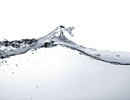 close-up of water wave against white backgroundの写真素材