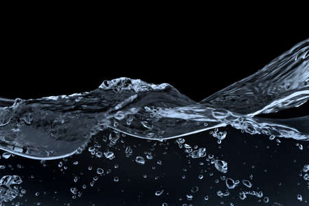 air bubbles in water isolated on black backgroundの写真素材