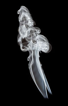 smoke isolated on deep black backgroundの写真素材