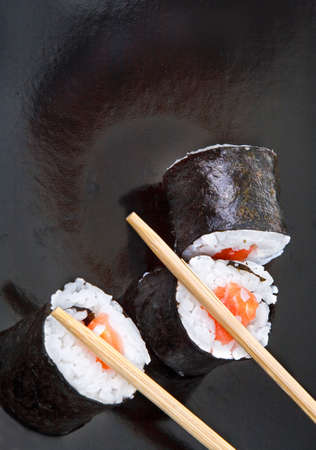 close-up of sushi and chopsticks の写真素材