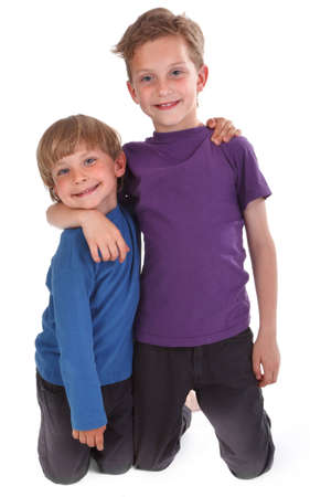 two happy brothers against white background