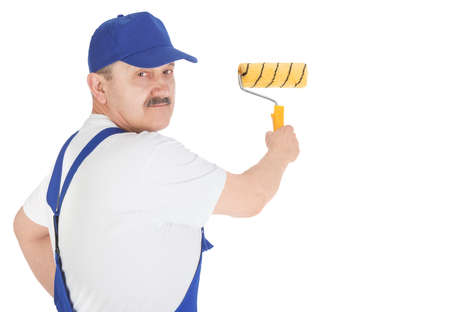 Portrait house painter is painting invisible wall, isolated on white backgroundの写真素材