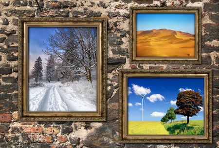 Wooden frames with beautiful landscapes over ruined brick wall, photos inside frames are my property...