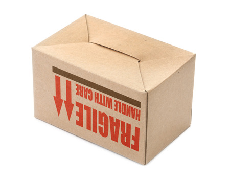 cardboard box upside down over white background