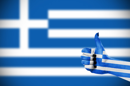 Flag of Greece on female's handの写真素材
