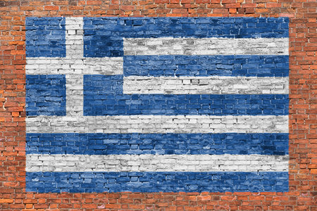 Flag of Greece painted over aged brick wallの写真素材