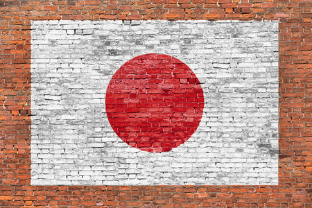 Flag of Japan painted over aged brick wallの写真素材