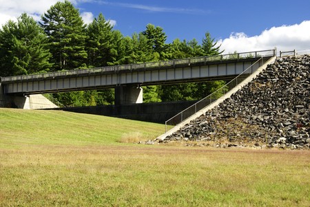 a bridge leading to the dam の写真素材