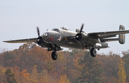 Monroe, North Carolina - November 4, 2012:  World War II B-25 Mitchell Bomber Performing during Warbirds Over Monroe Air Show in Monroe, NC, on November 4, 2012.のeditorial素材