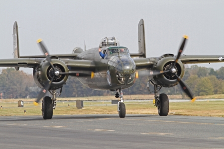 Monroe, North Carolina - November 4, 2012:  World War II B-25 Mitchell Bomber Performing during Warbirds Over Monroe Air Show in Monroe, NC, on November 4, 2012.のeditorial素材