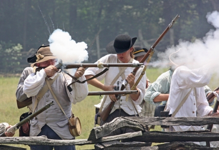Rock Hill, South Carolina -  July 11, 2009:  Revolutionary War reenactors recreate the Battle of Huck's Defeat, fought on July 12, 1780, on the grounds of Historic Brattonsville in South Carolina.のeditorial素材