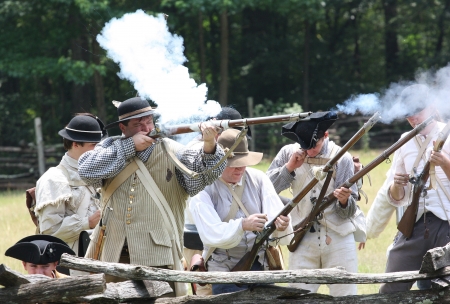 Rock Hill, South Carolina -  July 11, 2009:  Revolutionary War reenactors recreate the Battle of Huck's Defeat, fought on July 12, 1780, on the grounds of Historic Brattonsville in South Carolina.のeditorial素材