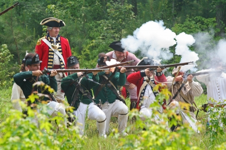 Rock Hill, South Carolina -  July 11, 2006:  Revolutionary War reenactors recreate the Battle of Huck's Defeat, fought on July 12, 1780, on the grounds of Historic Brattonsville in South Carolina.のeditorial素材
