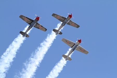 Monroe, North Carolina - November 10, 2013 - Three Aerobatic Aircraft Performing during Warbirds Over Monroe Air Show in Monroe, NC  のeditorial素材
