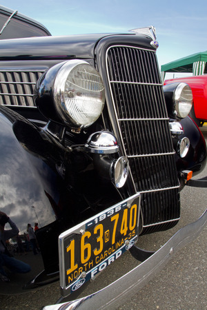 CONCORD NC - APRIL 11 2015:  A 1935 Ford automobile on display at the Charlotte AutoFair classic car show held at Charlotte Motor Speedway.のeditorial素材
