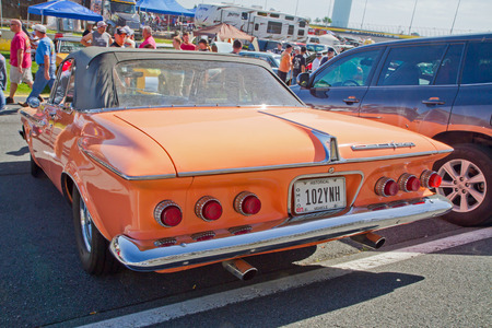 CONCORD NC - APRIL 11 2015:  A 1962 Plymouth Fury convertible automobile on display at the Charlotte AutoFair classic car show held at Charlotte Motor Speedway.のeditorial素材