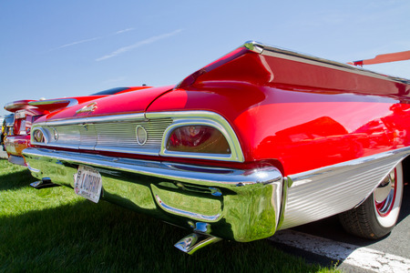 CONCORD NC - APRIL 11 2015:  A 1960 Ford Sunliner automobile on display at the Charlotte AutoFair classic car show held at Charlotte Motor Speedway.のeditorial素材