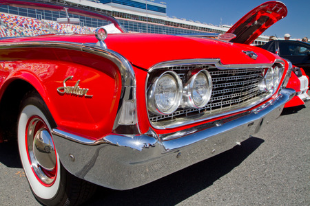 CONCORD NC - APRIL 11 2015:  A 1960 Ford Sunliner automobile on display at the Charlotte AutoFair classic car show held at Charlotte Motor Speedway.のeditorial素材