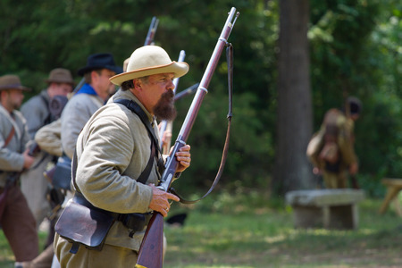 HUNTERSVILLE NC  JUNE 6 2015:  Closeup of a reenactor in a Confederate army uniform at an American...