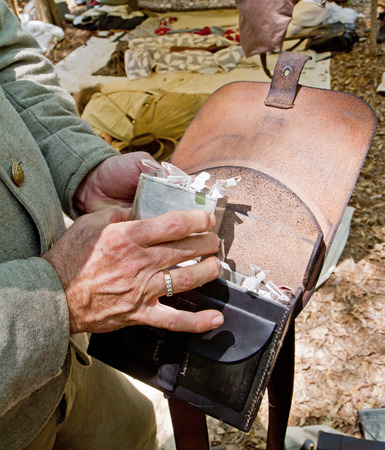 HUNTERSVILLE NC  JUNE 6 2015:  Closeup of a Confederate ammunition pouch worn by a participant in an...