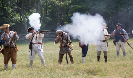 MCCONNELLS, SC - July 11, 2015:  American Revolutionary War reenactors recreate the Battle of Huck's Defeat at Historic Brattonsville.  The Patriot victory was originally fought nearby on July 12, 1780.のeditorial素材