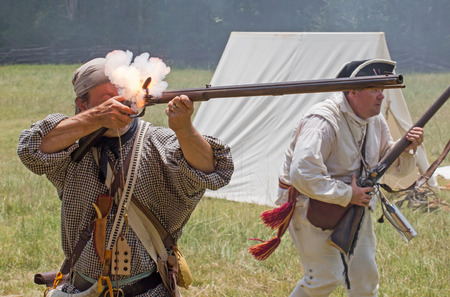 MCCONNELLS, SC - July 11, 2015:  American Revolutionary War reenactors recreate the Battle of Huck's Defeat at Historic Brattonsville.  The Patriot victory was originally fought nearby on July 12, 1780.のeditorial素材