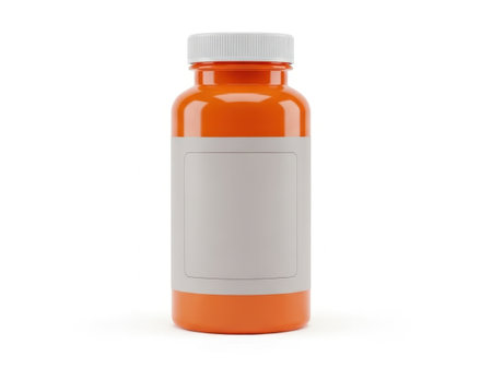 The image features a single, upright orange prescription bottle with a white label. The bottle has a white cap and is set against a plain white background. The label on the bottle is blank, and the bottle appears to be empty. The overall image is simple and clear, focusing solely on the bottle.の素材