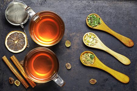 tea accessories composition on rustic backgroundの写真素材