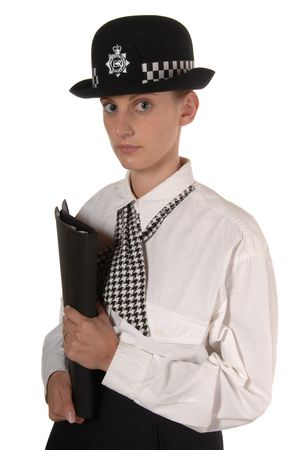 Uniformed UK female police officer holding files and paper work