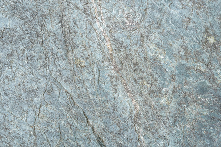 Textured blue gray stone, as a backgroundの写真素材
