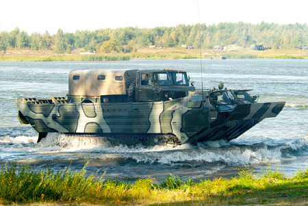 Floating transporter PTS-2 out of the water after the car ferry across the river.のeditorial素材