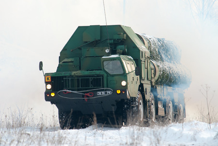 KIEV REGION, UKRAINE - 14 NOVEMBER 2007. Launcher missile air defense systems S-300 goes into the firing position.のeditorial素材