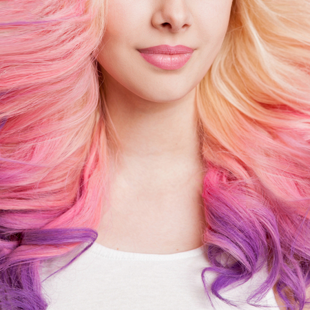 Youth women with curly colored hair. white background. Detail. Isolated.の写真素材