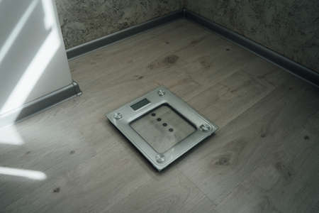 Home floor scales on the grey floor