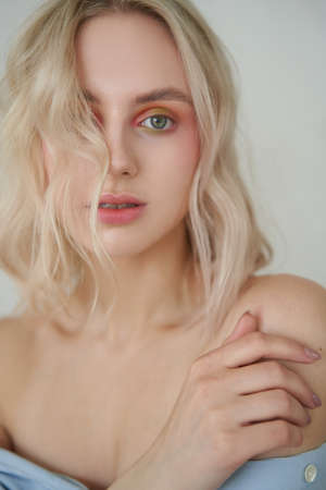 beauty portrait of blonde natural woman with soft fresh colorful make-upの写真素材