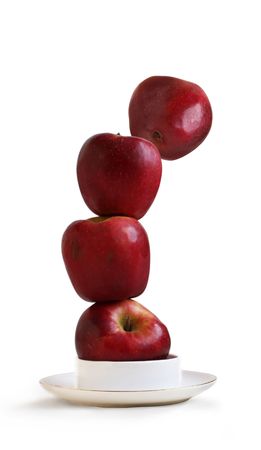 Stack of red apples on a white background の写真素材