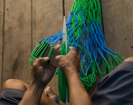 Made colorful hammock by hand ,local hammock of native people in Thailand.