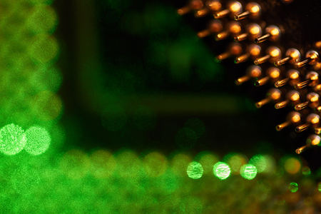 The micro elements of computer central processor unit, CPU contact pins close up.の写真素材