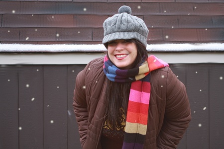 Pretty Woman Standing in Winter Snowの写真素材