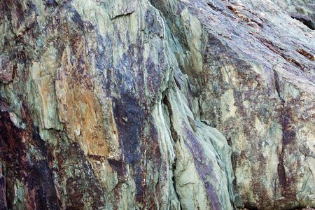 The coastal rock photographed, close up, perfectly approaches as a background.