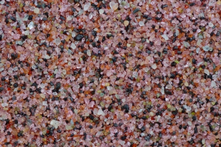 Macro view on unique reddish sand containing decorative minerals. の写真素材