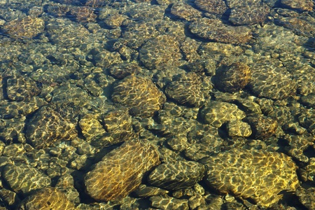 beautiful stones in crystal clean waterの写真素材