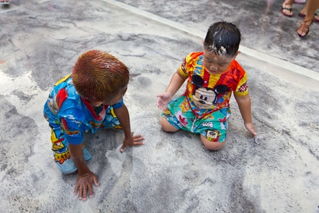 KHAO SAN ROAD, BANGKOK - 2012 APRIL 13: Kid playing in Songkran Festival 3のeditorial素材