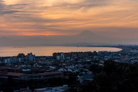 Sunset view of Tsujido beach with hiding Mt. Fuji in Kanazawa prefectureの写真素材