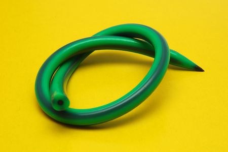 pencil on a yellow backgroundの写真素材