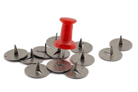 Steel and plastic pushpins isolated over white 
